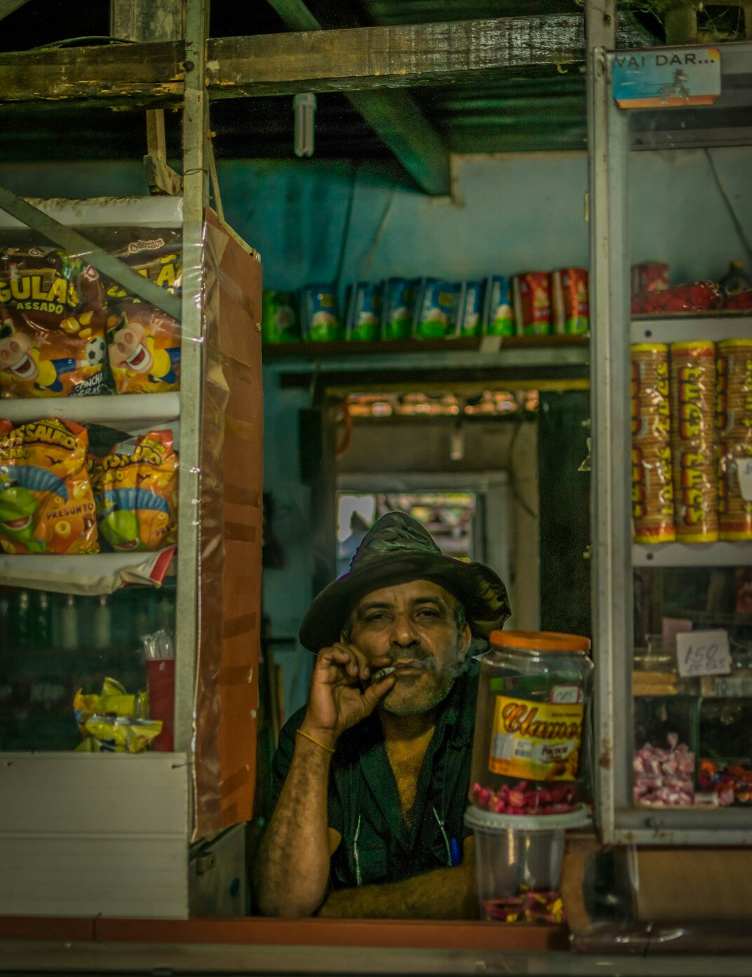 Elderly Chilean woman shopkeeper in a traditional neighborhood store
