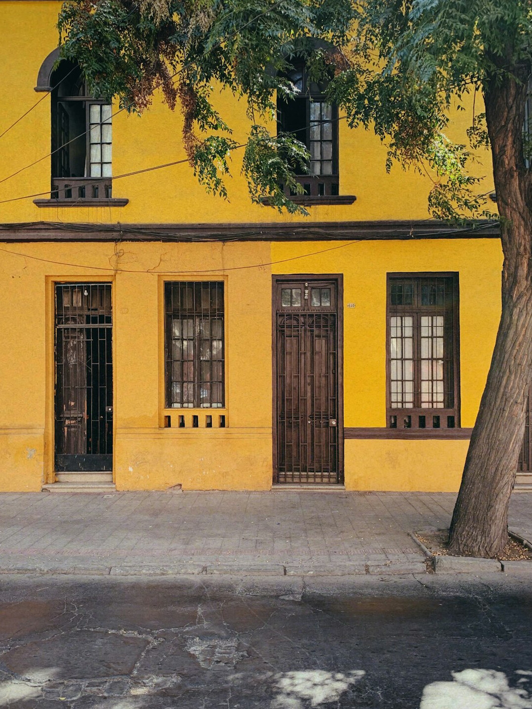 Row of old neglected houses in Barrio Yungay, Santiago