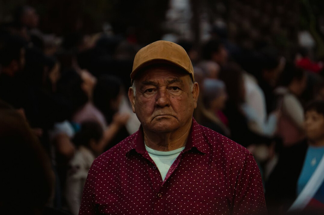 Portrait of a senior Chilean documentary photographer and project founder